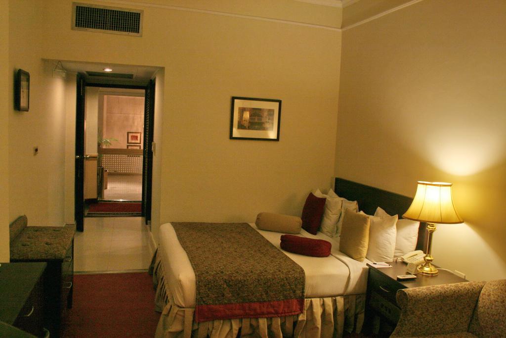 Smart Hotel Lahore Rom bilde